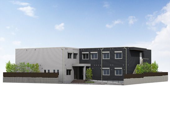 グレーと濃紺のツートンカラーの2階建て老人ホーム