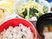 混ぜご飯や麩の浮いた汁物、サラダなどがそれぞれ異なる器に盛られている。