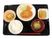 おいしそうな食事が並んだトレー。とんかつに白いご飯、みそ汁、そしてフルーツや野菜。