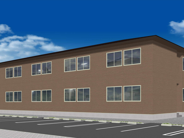広い駐車スペースがある茶色い外壁の2階建て建築物 外観2 ライフパートナー交野は各階に食堂あり。お隣の方や同じ階の方と交流しやすい環境です。