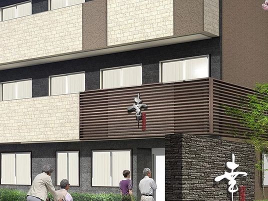 幸の文字が掲げられている高齢者向け住宅の外観パース