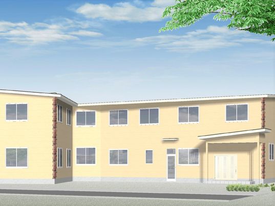 四角い建物の外観パース。淡い色合いの外観をパースで書き起こしたもの