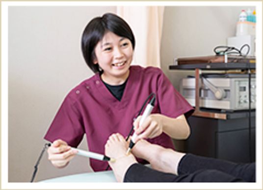 施術中の様子スタッフ
