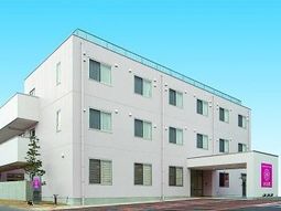 清潔感のある白い外壁の建物