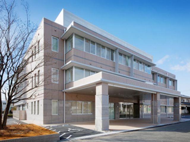 落ち着いた建物の外観 外観 広々とした外観は、快適な職場環境を予感させます。自然光が柔らかく降り注いでいます。