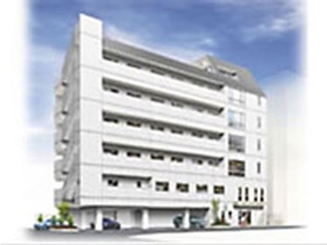 施設の外観 外観   白を基調とした建物で、窓が横に並ぶすっきりした外観です。勤務先の雰囲気をイメージしやすい落ち着いた印象です。