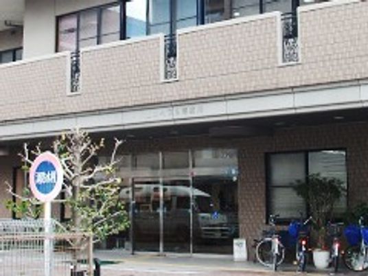自転車と看板の入口