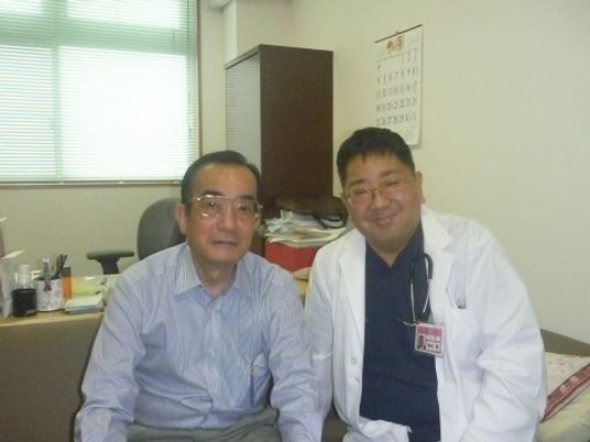 白衣の男性と利用者様