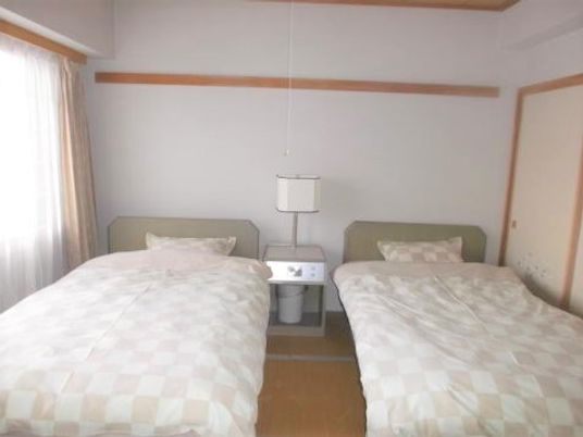 ツインのベッドがある部屋
