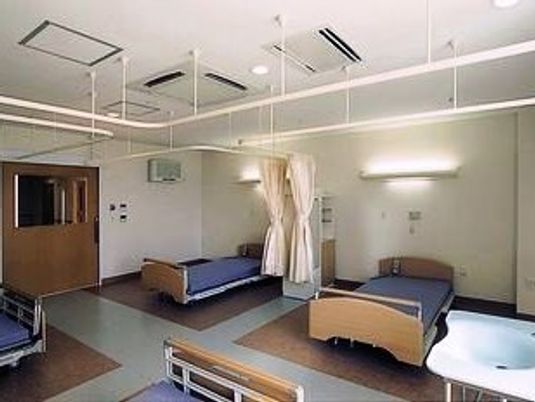 居室のベッドが並ぶ部屋  