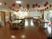 サムネイル 施設の写真 「介護付有料老人ホーム あんしん館」のダイニング兼食堂。華やかな飾りを天井に彩っている。