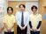 スタッフ三人立つ廊下端