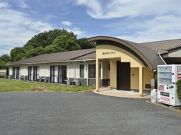 庭のある外観