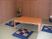 サムネイル 施設の写真 共有スペースに完備された和様式の休憩スペースである。いぐさの香りする畳敷きに座卓や座布団が用意されている。