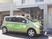 送迎車が停まる施設外観  