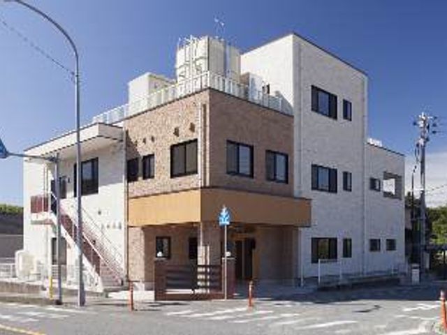 明るい外観の建物 外観 木目調のデザインが際立つ、爽やかな外観です。快適な職場環境を求める方に最適です。