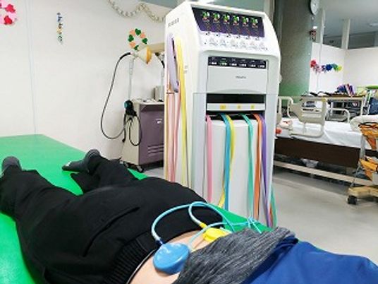 リハビリ機器と人