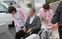 車椅子の介助者と利用者