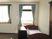 サムネイル 施設の写真 はな太宰府の居室。介護用ベッドや緊急コール、タンスなどを完備している。