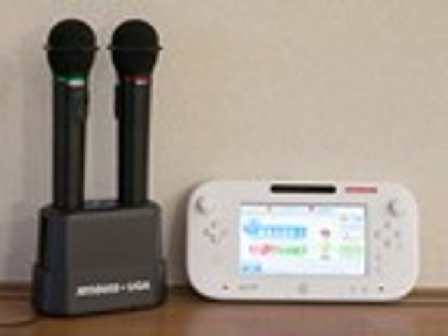 カラオケ機器と端末 多目的室 シンプルな操作パネルのカラオケ機器です。イベントや余暇時間に活用いただけます。
