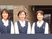 笑顔の職員3人の外観前  