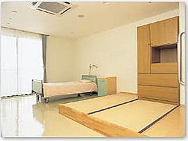 心地よい空間の居室 居室 自然光が差し込む明るい部屋です。和洋折衷のデザインが新鮮で、落ち着いた雰囲気を醸し出しています。