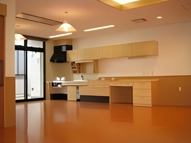 明るい空間のリビング リビング 自然光が入る明るい空間で、リラックスして時間を過ごせます。木製家具が温かみを感じさせます。