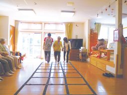 明るい居室と利用者