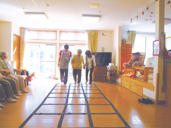 明るい居室と利用者