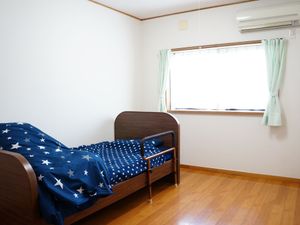 星柄のベッドがある居室