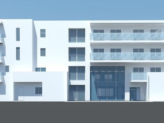外観のイメージ図。白い外壁の4階建て建物であり、正面には1階と2階がつながっている吹き抜け部分が見える。
