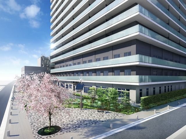 桜並木のある施設外観