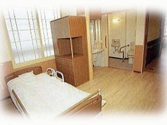 明るい居室のベッド  