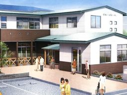 明るい日差しの施設外観