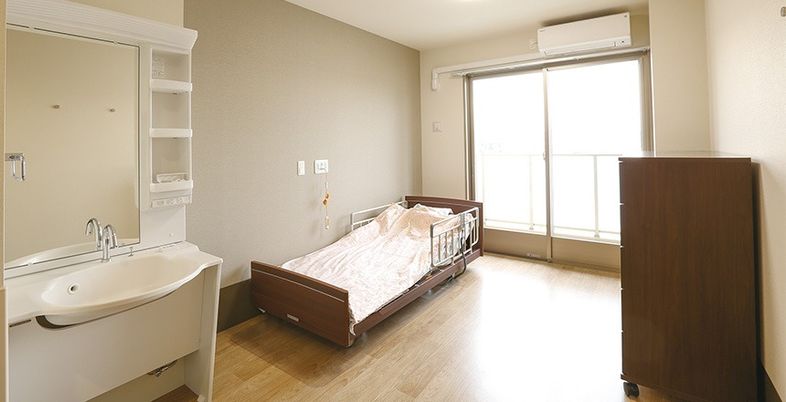 ベッドがある明るい部屋