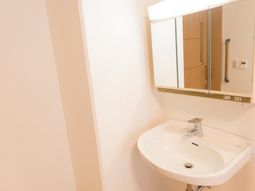 清潔な洗面台の一角