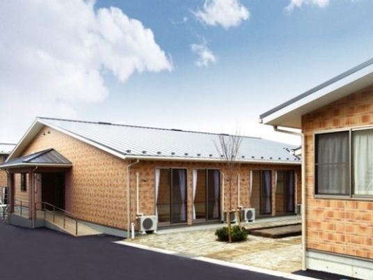 明るい居室の外観