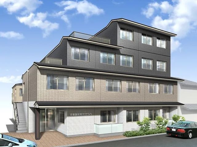 外観の建物正面 外観   落ち着いた色合いの外観で、窓が多く明るさを感じます。建物前には植栽もあり、すっきりした印象です。