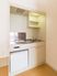洋室の一角の小型キッチン