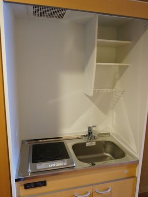 キッチンのシンクとコンロ