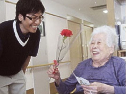 スタッフと利用者の笑顔