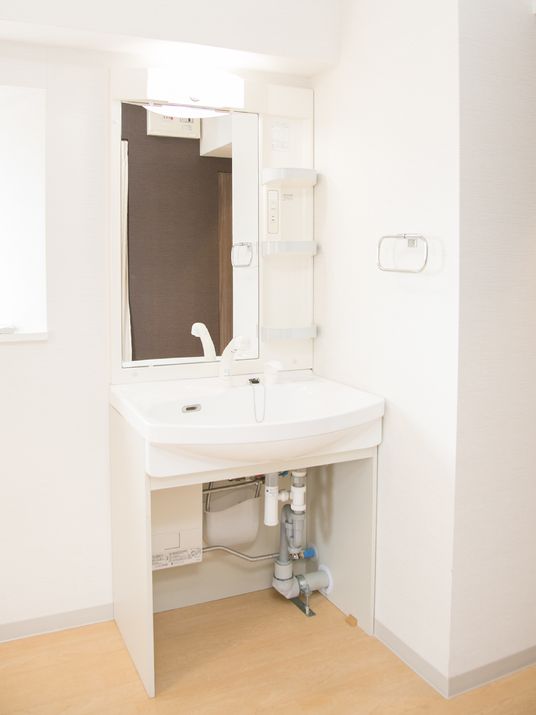 清潔な洗面台の一角