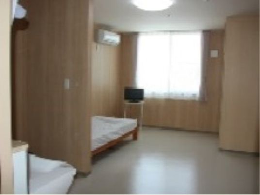 シンプルな安らぎの居室