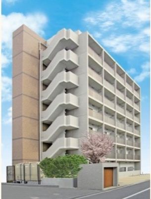 春の桜と共に立つ建物
