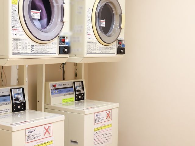 清潔なランドリーエリア 洗濯機 充実した設備のランドリースペースです。自由にお使いいただき、日々の生活を快適にサポートします。