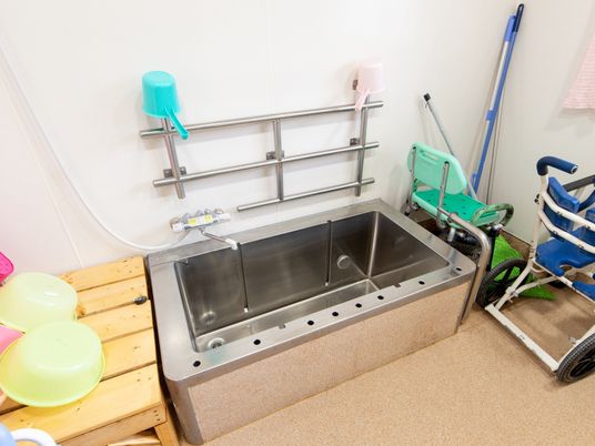 清掃用具とシンクの部屋