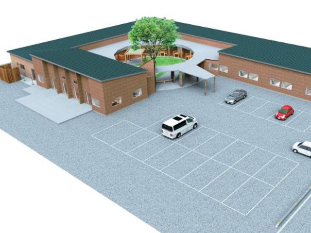 中庭付き施設外観 外観 ゆとりある駐車スペースが完備された、落ち着いた雰囲気の建物です。中庭の緑が心地よく、穏やかな時間を過ごせる環境が整っています。
