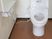 手すり付きトイレの室内