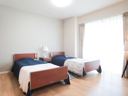 快適なベッドのある居室