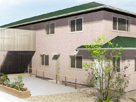 ピンクの建物と庭
